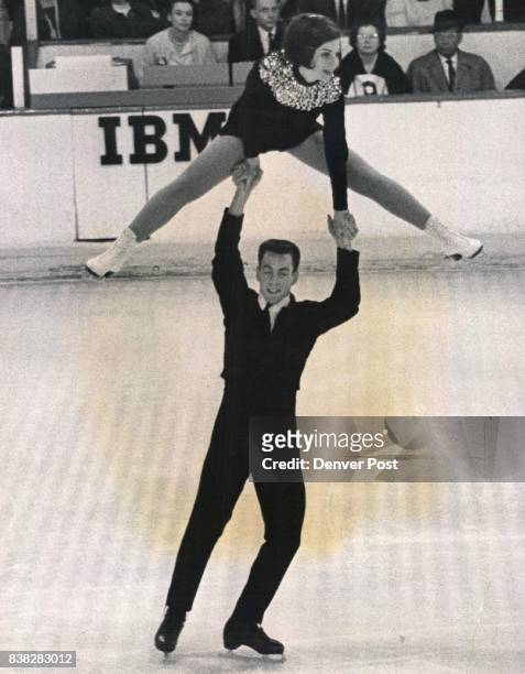 Joseph, Ronald & Vivian spts. File 5p Artistic Grace On Ice Ronald Joseph of the United States lifts his sister Vivian overhead during their pairs...