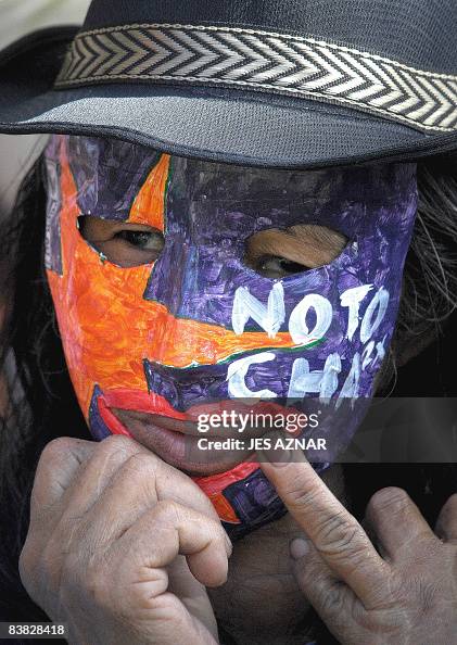 A protester wears a mask with slogan dur A protester wears a mask with slogan dur