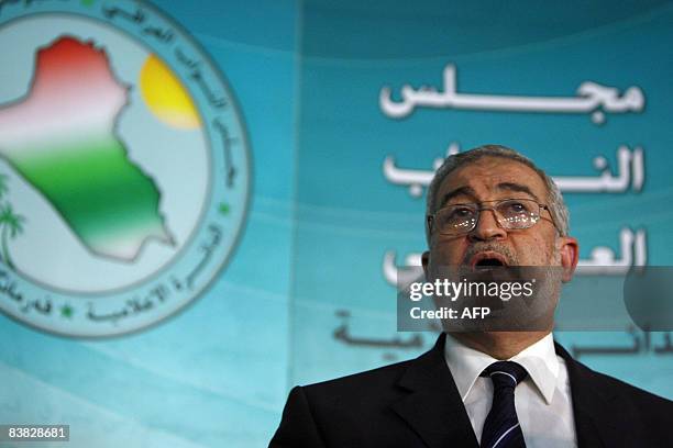 Iraqi MP Iyad al-Samarrai, speaks to the press outside the Iraqi parliament in Baghdad's fortified 'Green Zone' on November 26 2008. Iraqi lawmakers...