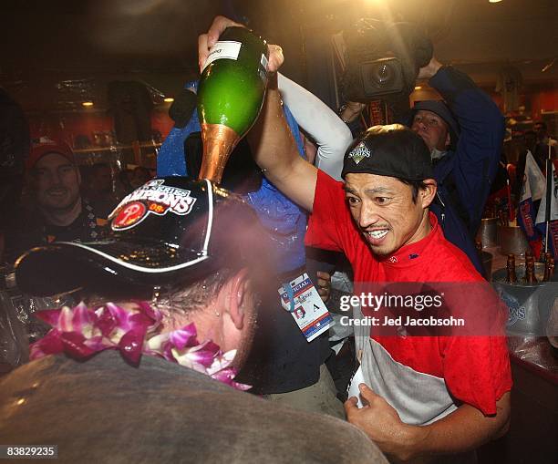 So Taguchi of the Philadelphia Phillies celebrates in the locker
