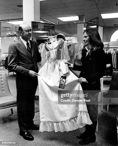 Daisy Day at Joslins' Planned Joslins president Donald Chabot confers with Mrs. Peter W. Pryor about Wednesday's "Daisy Day at Joslins," when members...