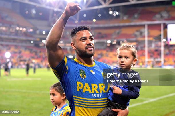 Kenny Edwards of the Eels celebrates victory with fans after the round 25 NRL match between the Brisbane Broncos and the Parramatta Eels at Suncorp...