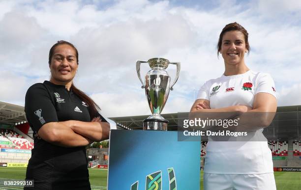 Sarah Hunter, captain of England and Fiao'o Faamausili captain of the New Zealand Black Ferns pose with the Women's Rugby World Cup prior to...