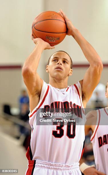 Stephen Curry of the Davidson Wildcats shoots a free throw against the Winthrop Eagles at Belk Arena on November 21, 2008 in Davidson, North...