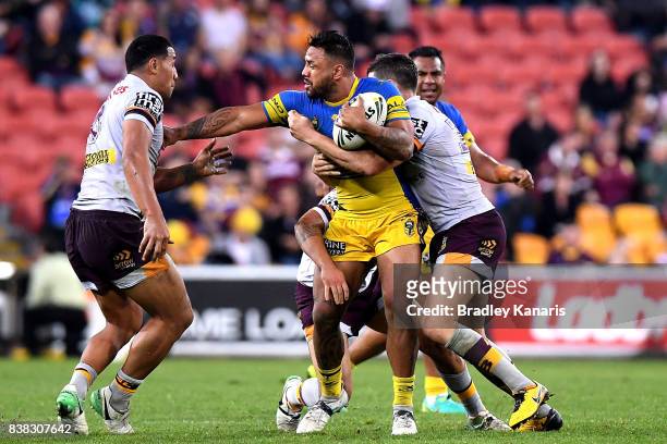 Kenny Edwards of the Eels attempts to break through the defence during the round 25 NRL match between the Brisbane Broncos and the Parramatta Eels at...