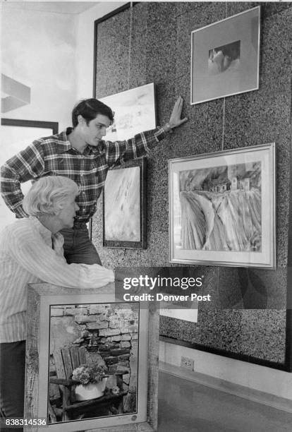 Art Collection Available To CSM Students Wally Jansen, Colorado School of Mines student from Holland, looks over part of the student loan art...