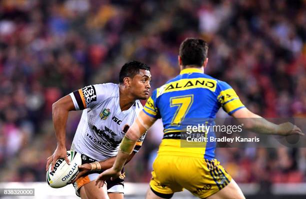 Anthony Milford of the Broncos looks to pass during the round 25 NRL match between the Brisbane Broncos and the Parramatta Eels at Suncorp Stadium on...