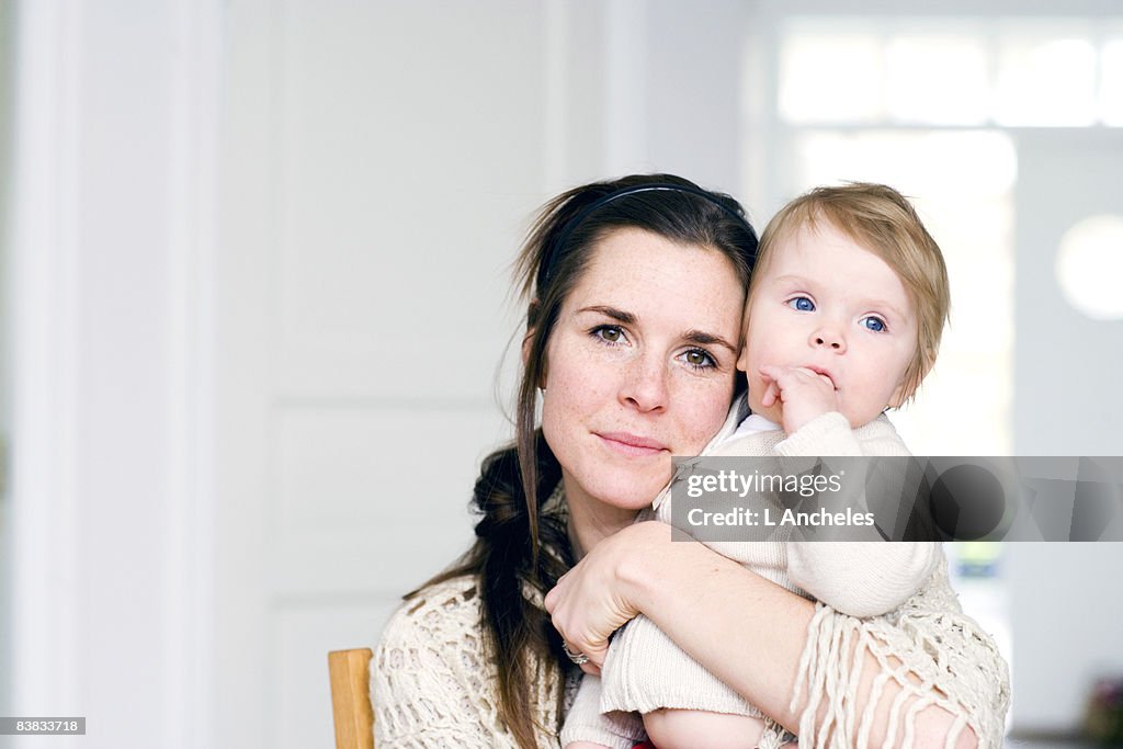 Woman embracing her child Sweden.