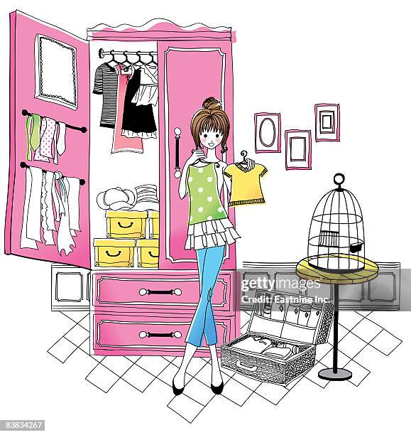 young woman holding skirt and t-shirt - open suitcase stock illustrations