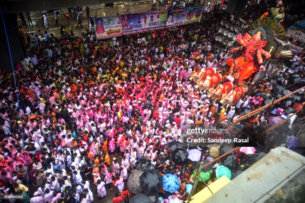 Devotees carry Ganesh Idol for immersion