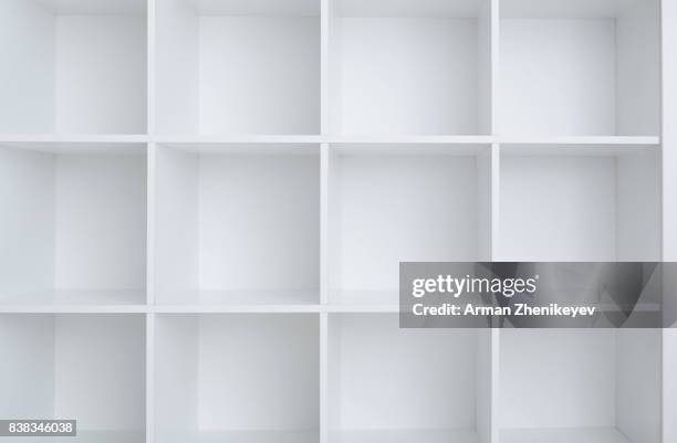 empty white shelf cabinet - abandoned store stockfoto's en -beelden