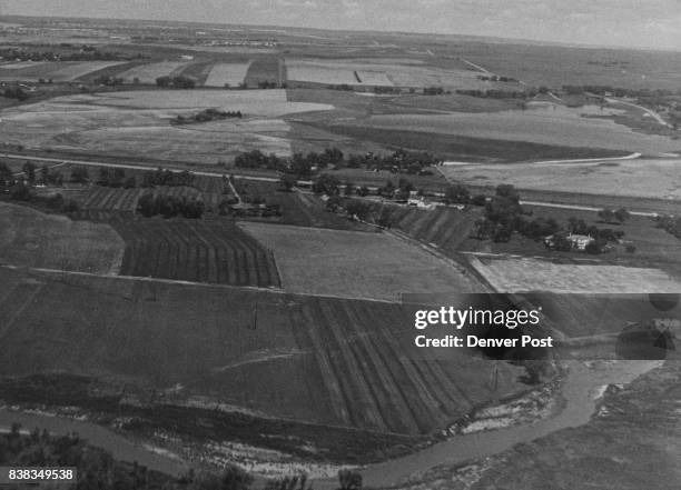 Site of new Gates Rubber Co. $28 million expansion program to be located in Arapahoe county along south plate river shown in foreground. Credit:...