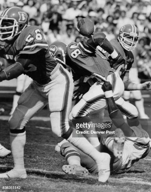 Football - Denver Broncos Pop Goes the ball as Broncos' Rick Upchurch is Hit on Kickoff Return Upchurch returned second-half kickoff 30 yards, but...