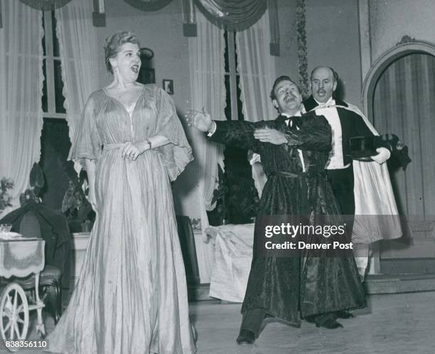 Ringing The Rafters Eva Likova as Rosalinda, John Alexander as Alfredo, and Osie Hawkins as Franke, rehearse a scene from "Die Fledermaus" for...