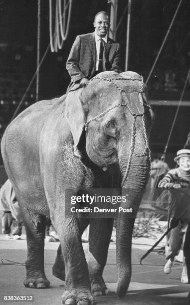 Wale Lumbers Into Coliseum With Clarence Freeman On Board "I felt I would fall off with every step," the Post writer said of ride. Credit: Denver Post