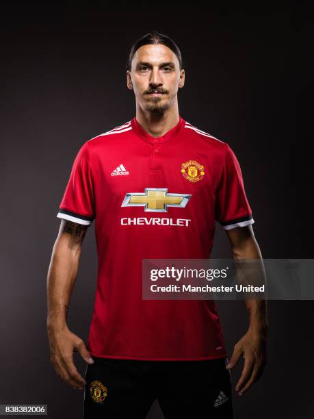 Zlatan Ibrahimovic of Manchester United poses after signing a new contract on August 24, 2017 in Manchester, England.