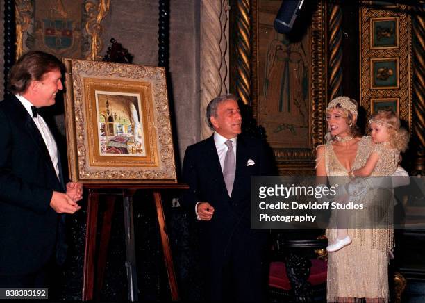 View of, from left, American real estate developer Donald Trump, musician Tony Bennett, actress Marla Maples, and her daughter, Tiffany Trump, during...