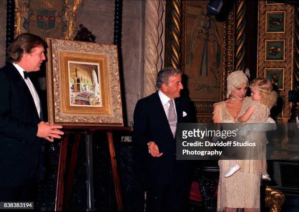 View of, from left, American real estate developer Donald Trump, musician Tony Bennett, actress Marla Maples, and her daughter, Tiffany Trump, during...