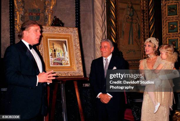 View of, from left, American real estate developer Donald Trump, musician Tony Bennett, actress Marla Maples, and her daughter, Tiffany Trump, during...