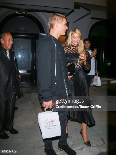 Paris Hilton and Chris Zylka are seen on August 23, 2017 in Los Angeles, California.