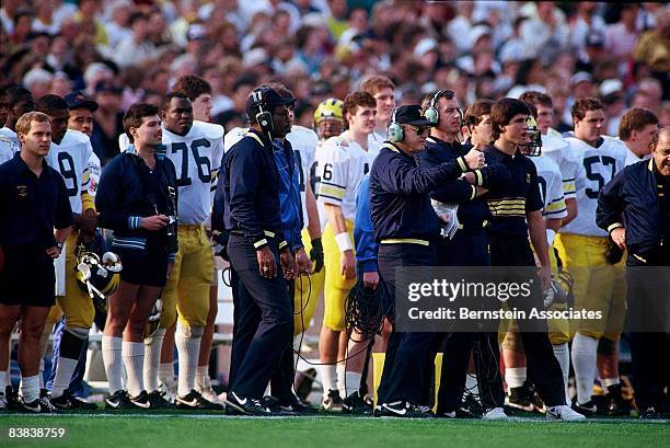 Head coach Bo Schembechler of the Michigan Wolverines sends a play in against the Arizona State Sun Devils during the Rose Bowl on January 1, 1987 at...