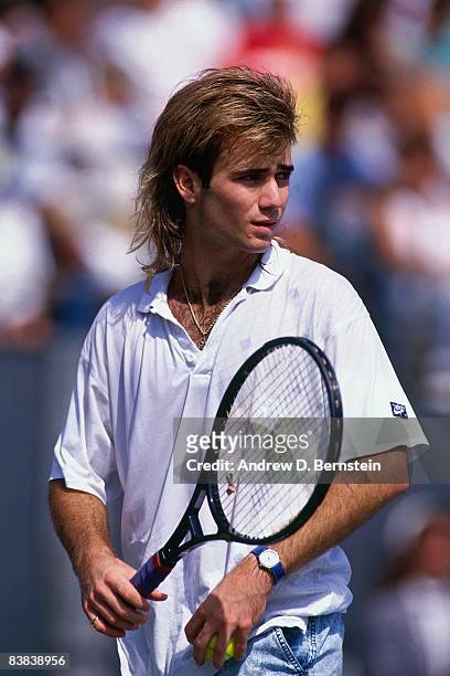 Andre Aggasi prepares to serve during the Volvo International Tennis Tournament on September 1988 in Los Angeles, California.