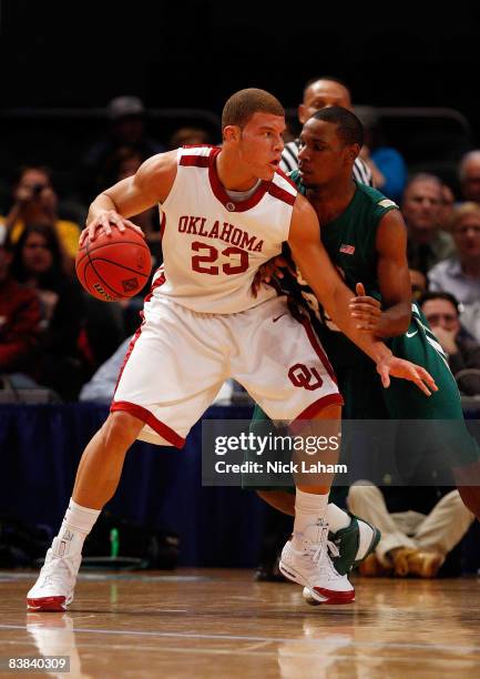 Blake Griffin of the Oklahoma Sooners goes up against Howard Crawford of the UAB Blazers during the pre-season NIT at Madison Square Garden November...