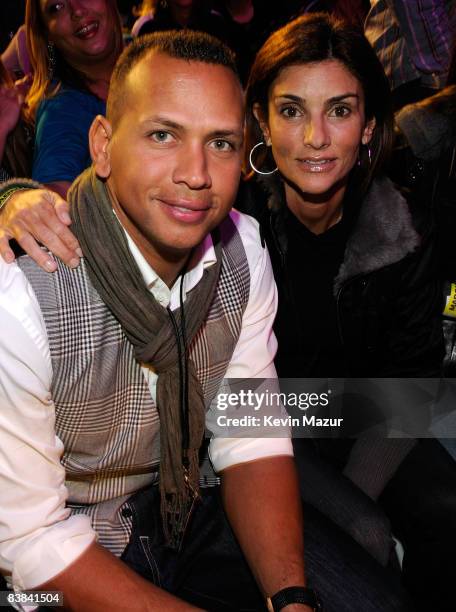 Alex Rodriguez and Ingrid Casares in the audience during the ''Sticky & Sweet'' tour at Dolphins Stadium on November 26, 2008 in Miami.