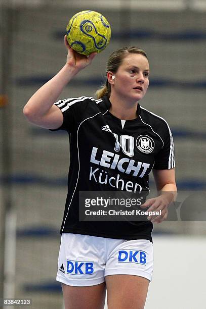 Anna Loerper of Germany throws the ball during the International Handball Friendly match between Germany and France at the Maxipark Arena on November...