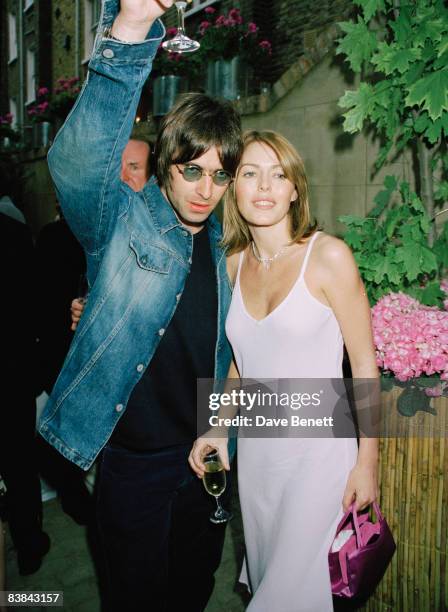 Oasis frontman Liam Gallagher with his wife, actress Patsy Kensit at a Vogue party, 19th May 1998.