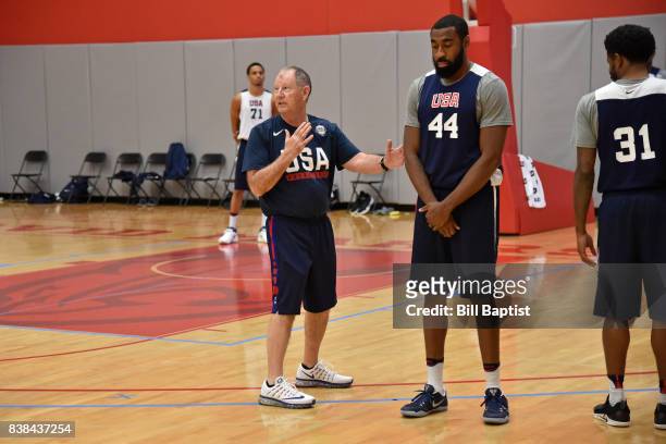 Morris McHone coaches Reggie Williams of the USA AmeriCup Team during a training camp at the University of Houston in Houston, Texas on August 23,...
