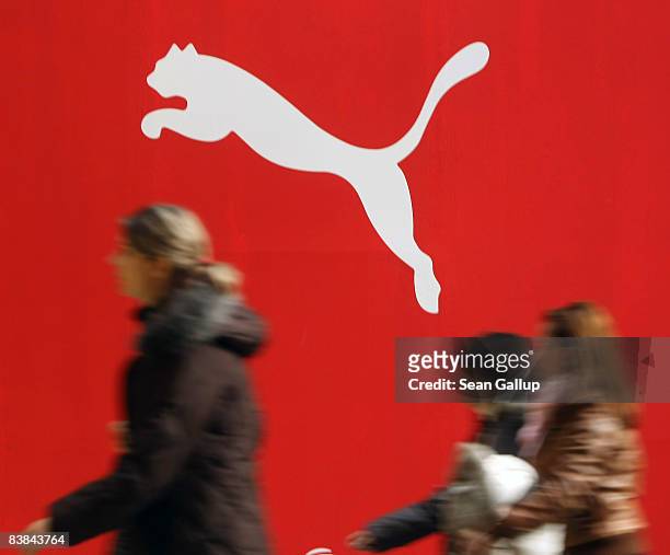 People walk past a Puma store under construction during the Christmas season at the Arkaden shopping mall on November 27, 2008 in Berlin, Germany....