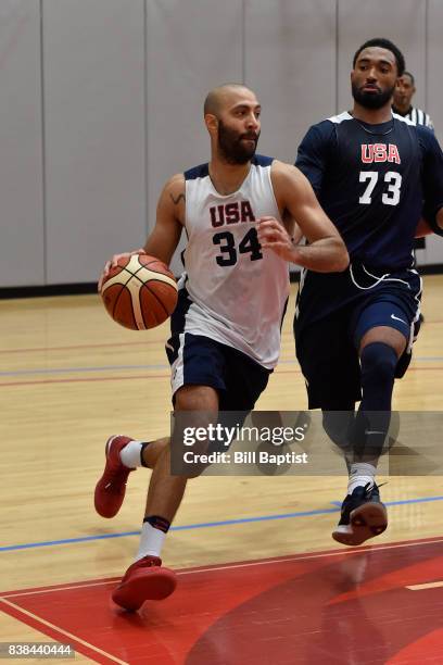 Kendall Marshall of the USA AmeriCup Team drives to the basket during a training camp at the University of Houston in Houston, Texas on August 23,...