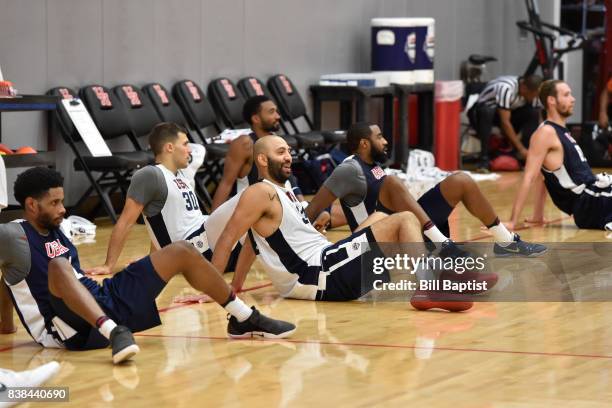 Kendall Marshall of the USA AmeriCup Team smiles and stretches during a training camp at the University of Houston in Houston, Texas on August 23,...