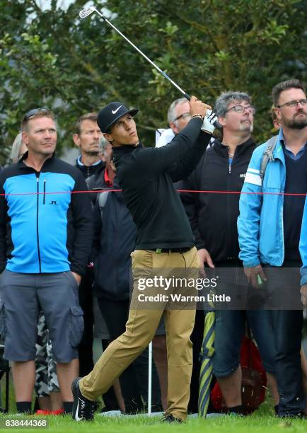 Thorbjorn Olesen of Denmark hits his second shot on the 1st hole during day one of Made in Denmark at Himmerland Golf & Spa Resort on August 24, 2017...