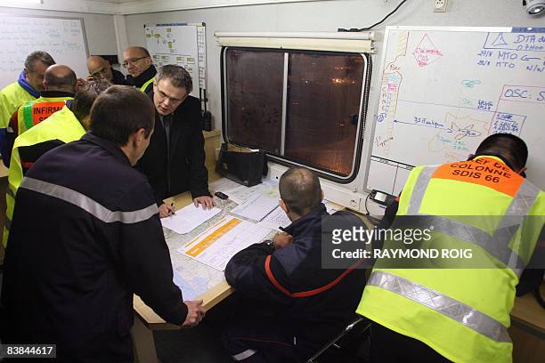 Rescuers work in a field headquarters after a Air New Zealand airbus A320 plane crashed on November 27, 2008 offshore Canet-en-Roussillon in...