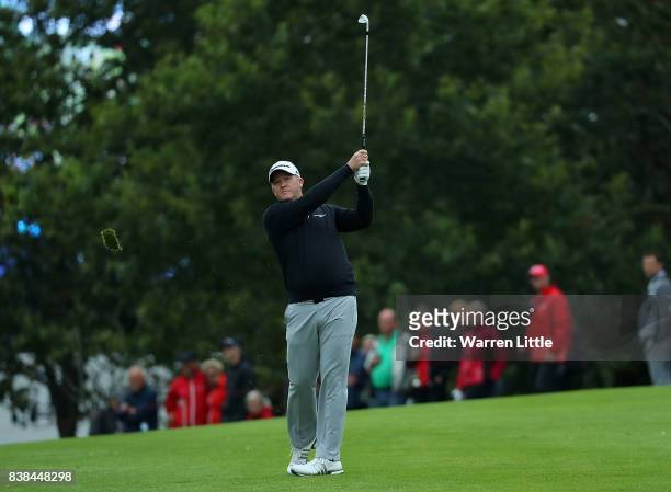 Stephen Gallacher of Scotland hits his second shot on the 1st hole during day one of Made in Denmark at Himmerland Golf & Spa Resort on August 24,...