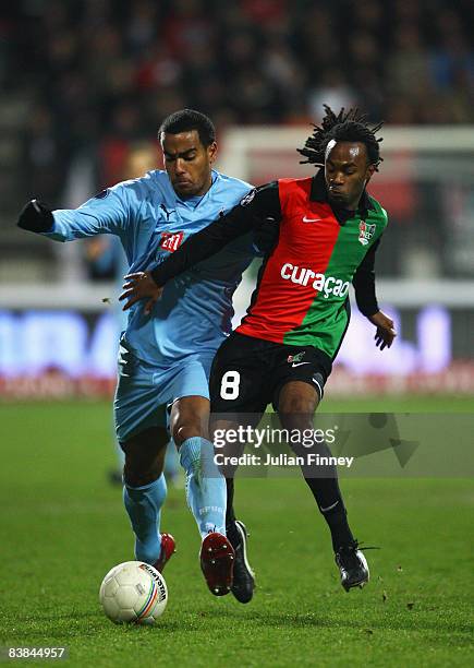 Tom Huddlestone of Spurs battles with Lorenzo Davids of NEC during the UEFA Cup match between NEC Nijmegen and Tottenham Hotspur at the McDOS...