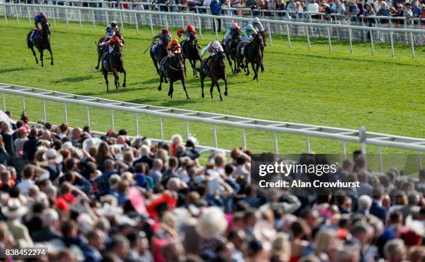 Daniel Muscutt riding Fleur Forsyte win The British EBF & Sir Henry Cecil galtres Stakes at York racecourse on August 24, 2017 in York, England.