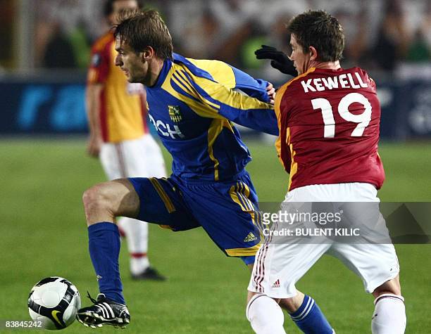 Metalist Kharkov's Marko Devic fights for the ball with Galatasaray's Harry Kewell on November 27, 2008 during the UEFA Cup 3rd Group match between...