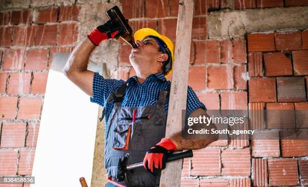 mature worker on break - beer goggles stock pictures, royalty-free photos & images