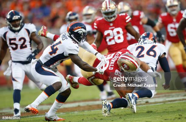 Vance McDonald of the San Francisco 49ers runs after making a reception during the game against the Denver Broncos at Levi Stadium on August 19, 2017...