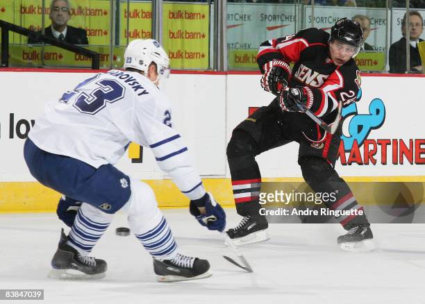 Anton Volchenkov of the Ottawa Senators shoots the puck past Alexei Ponikarovsky of the Toronto Maple Leafs at Scotiabank Place November 27, 2008 in...