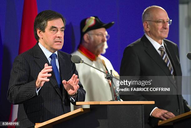 French Prime Minister François Fillon gestures during a press conference with Swiss President Pascal Couchepin after an official working meeting at...