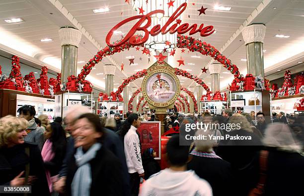 Crowd of shoppers hunt for bargains at Macy's on November 28, 2008 in New York City. The day after Thanksgiving, often referred to as "Black Friday",...