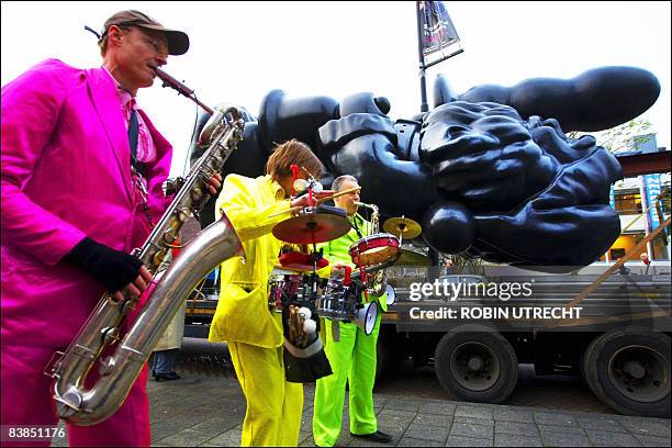 Santa Claus sculpture by artist Paul McCarthy is moved to its designation in Rotterdam on November 28, 2008. The sculpture, meant to be placed in a...