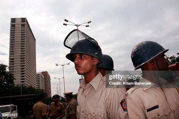 Policemen stand on high alert outside the Oberoi Hotel on November 28, 2008 in Mumbai, India. Following terrorist attacks on three locations in the...