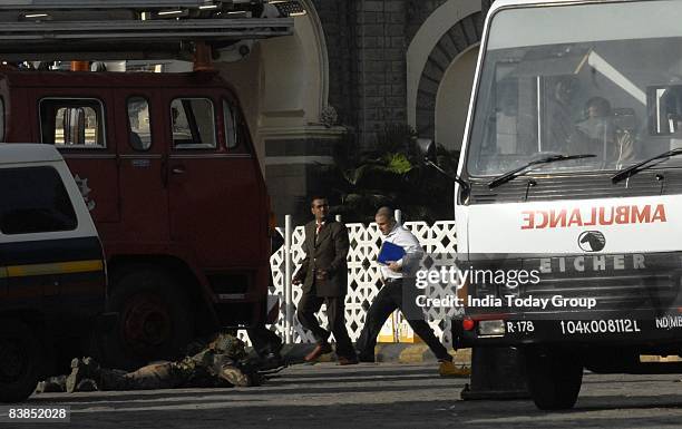 Hostage is rescued from Hotel Taj Mahal on November 28, 2008 in Mumbai, India. Following terrorist attacks on three locations in the city which have...