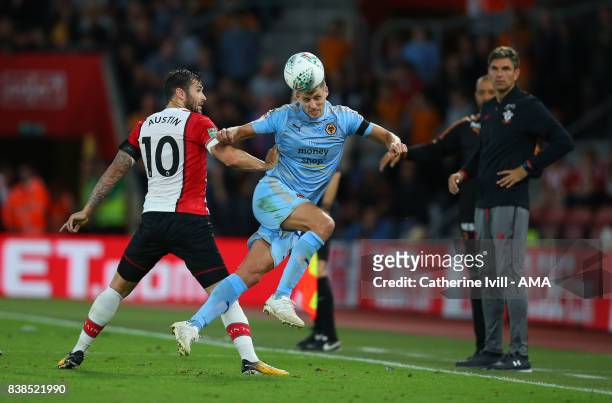 Dave Edwards of Wolverhampton Wanderers and Charlie Austin of Southampton during the Carabao Cup Second Round match between Southampton and...