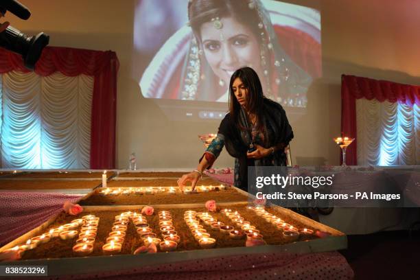 Sneha Hindocha, who is first cousin to Anni Dewani, lights a candle in her memory to mark her murder one year ago whilst on honeymoon.